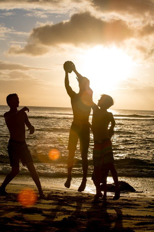 boys on the beach silhouette 