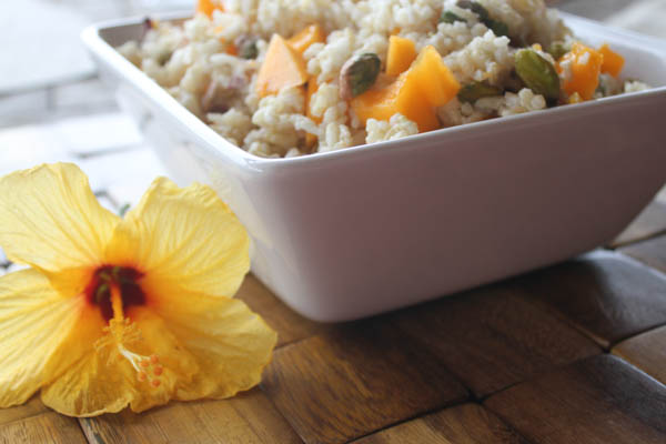 Tropical coconut rice with fresh papaya and pistachios